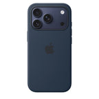 Orange silicone case with MagSafe attached to a midnight iPhone 17 Pro, showing a close-up of the protective cover.