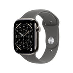Apple Watch Series 11 with natural titanium case and stone grey sport band, showing the watch face and band details.