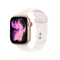 Apple Watch Series 11 with rose gold aluminum case and light blush sport band, shown on a wrist with digital display.