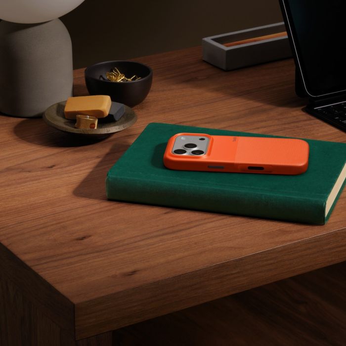 Oraxxi Beats Rugged Case with MagSafe and Camera Control for iPhone 17 Pro in Sierra Orange, showing protective design and button access.
