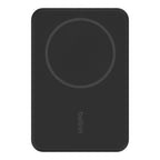 Black Belkin 5K Magnetic Wireless Power Bank with 5000mAh capacity and integrated kickstand, designed for charging on the go.