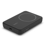 Black Belkin 5K Magnetic Wireless Power Bank with 5000mAh capacity and integrated kickstand, branded by Oraxxi.