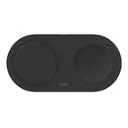 Black Belkin BoostCharge Pro 2-in-1 Wireless Charger on a sleek surface, showing its dual charging pads for devices and earbuds.