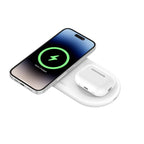 White Belkin BoostCharge Pro 2-in-1 wireless charger on a sleek surface, designed for fast charging smartphones and compatible devices.