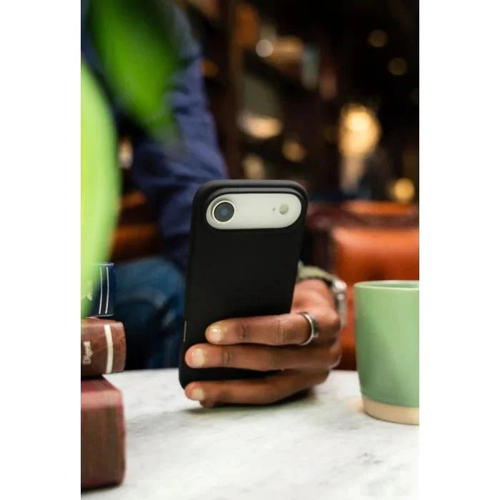 Black Moov SoftTouch case with MagSafe for iPhone Air by Oraxxi, showing the textured soft-touch surface and magnetic alignment.
